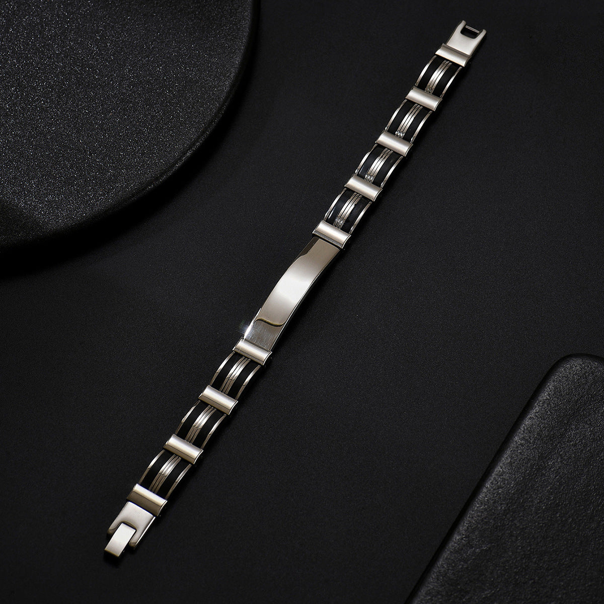 Men's Rail Panel Bracelet in black and silver-tone stainless steel – original flat view of ID bar, channel links and clasp