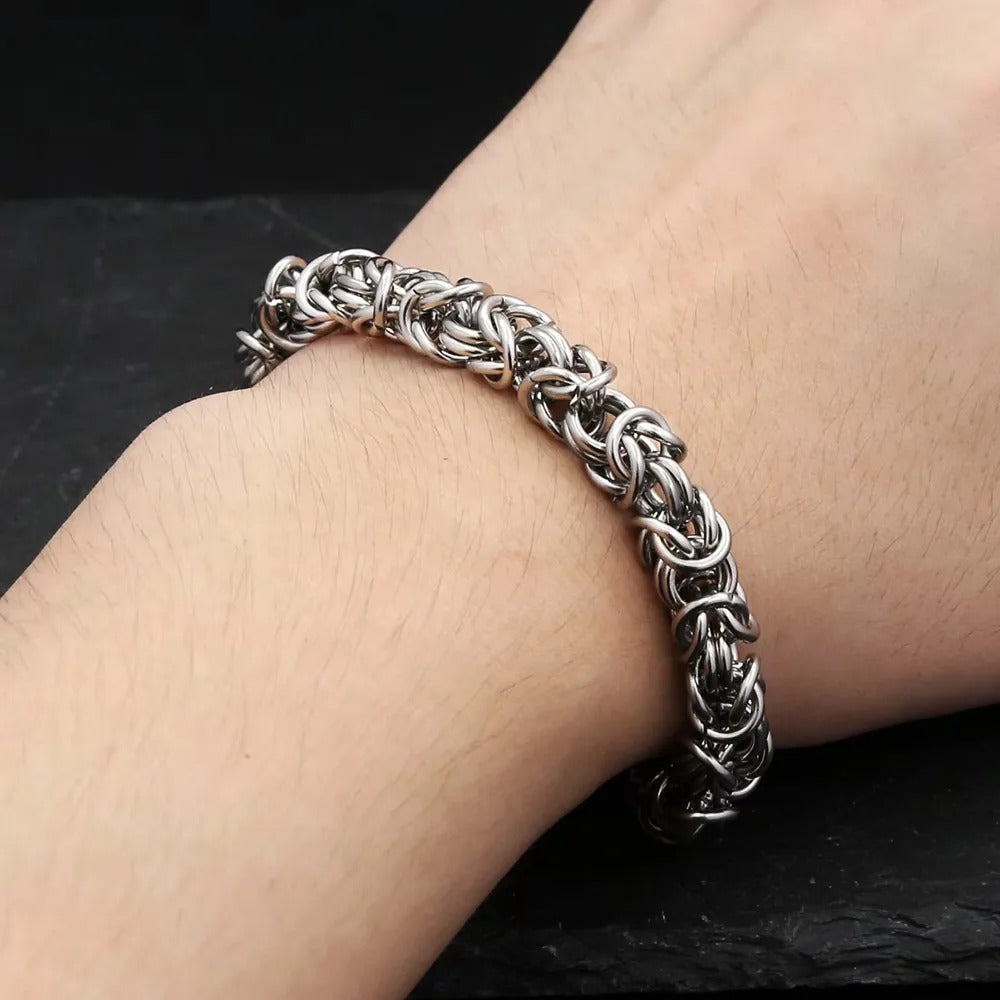 Men's Round Ring Byzantine Bracelet in Silver-Tone Steel – contextual scene, on wrist