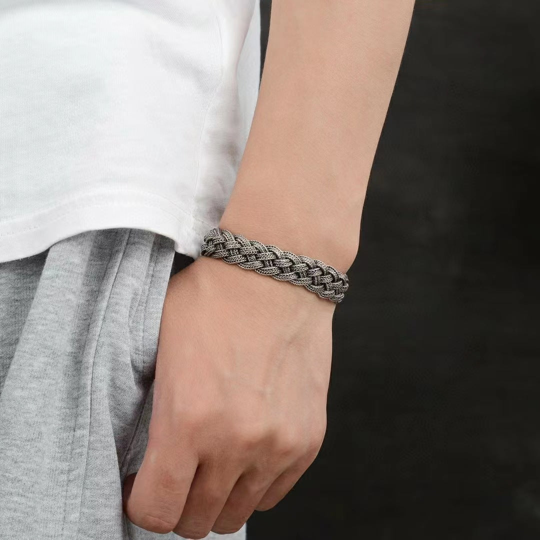 Men's Cable Plait Bracelet in Sterling Silver – contextual scene, original on wrist