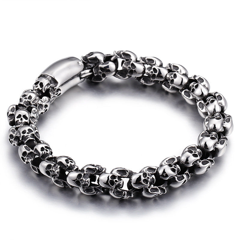 Men's Four Face Skull Bracelet in Silver-Tone Steel – front view