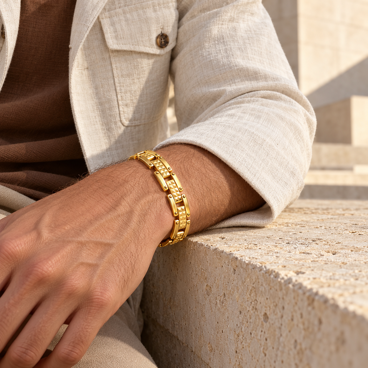 Men's Pyramid Rail Gold Plated Bracelet in 18K Gold Plated Stainless Steel – contextual scene, on wrist