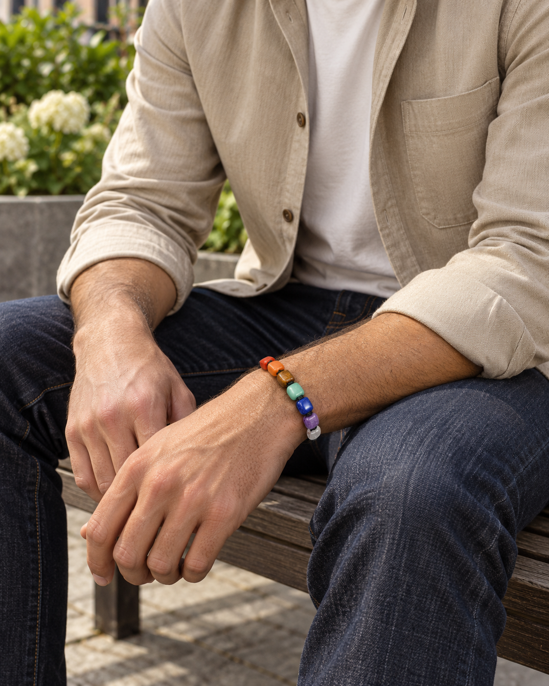 Spectrum Cord Bracelet — contextual scene, torso and hands