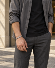 Flat Snake Link Bracelet — contextual scene, torso and hands