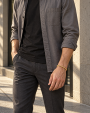 Gold Mesh Segment Bracelet — contextual scene, torso and hands