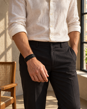 Layered Weave Bracelet — contextual scene, torso and hands