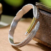 Men's Feather Open Cuff in silver-tone and gold-tone zinc alloy – detail