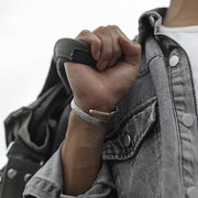 Men's Feather Open Cuff in silver-tone and gold-tone zinc alloy – on wrist