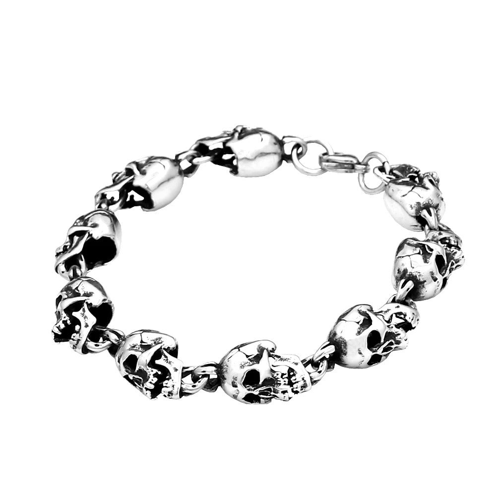 Men's Hollow Skull Ring Link Bracelet in Steel; Antiqued Silver-Tone Finish – front view