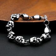 Men's Hollow Skull Ring Link Bracelet in Steel; Antiqued Silver-Tone Finish – original hollow skull heads, ring connectors and toggle detail