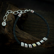 Men's Seven Glyph Braid Bracelet in Sterling Silver and Black Faux Leather – original braided band, engraved beads, clasp and extension detail