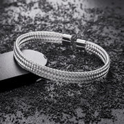 Men's Fine Mesh Open Cuff in silver-tone stainless steel – original woven-strand and end-cap detail