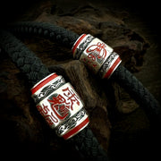 Men's Script Barrel Sterling Silver Cord Bracelet in Sterling Silver and Black Textile Cord – original engraved barrel and textile braid close-up