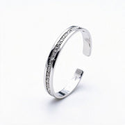 Men's Riven Texture Cuff in Sterling Silver – side detail of the irregular textured silver strip