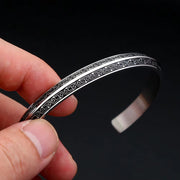 Men's Meander Rail Cuff in silver-tone Steel – original detail of the surface and opening