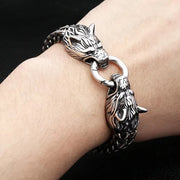 Men's Twin Wolf Ring Bracelet in Silver-Tone Steel – contextual scene, on wrist against dark fabric