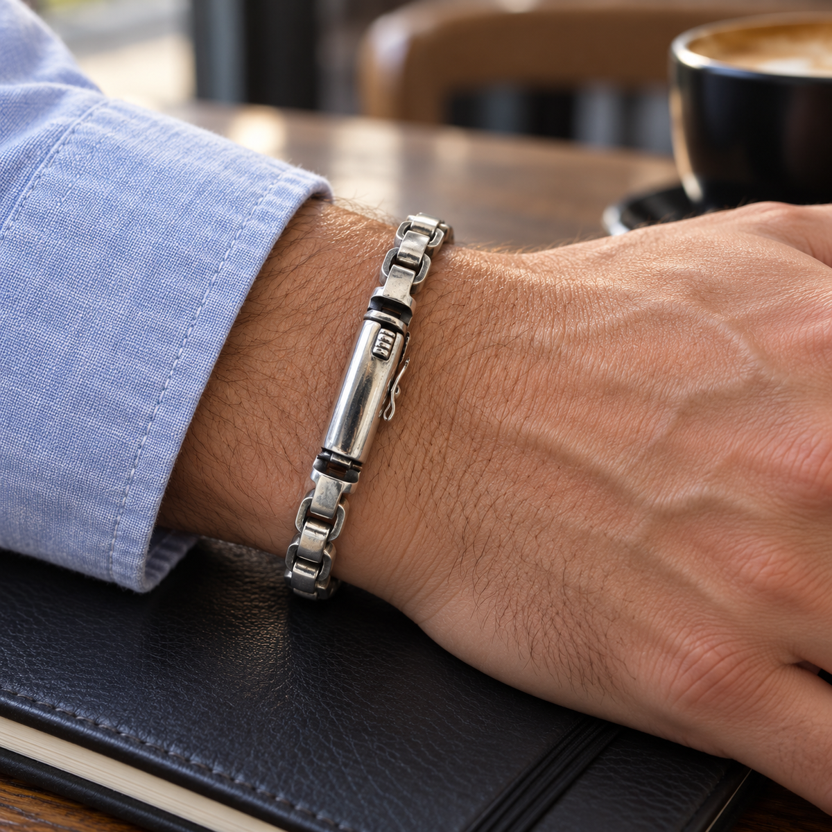 Men's Squared Link Bracelet in Sterling Silver – contextual scene, on wrist with blue shirt