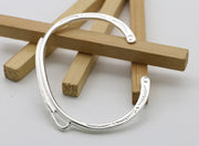 Men's Quill Line Cuff in Sterling Silver – original detail of the feather and band