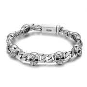 Men's Spaced Skull Curb Bracelet in Sterling Silver – front view