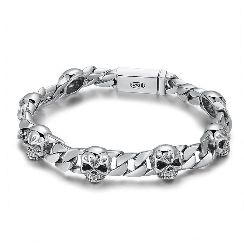 Men's Spaced Skull Curb Bracelet in Sterling Silver – front view