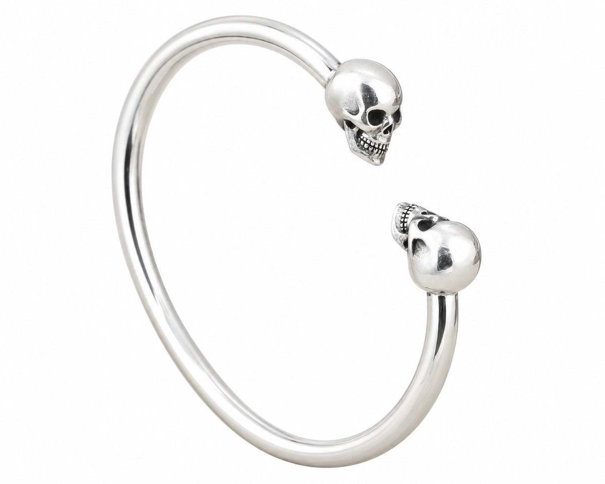 Men's Smooth Twin Skull Cuff in Sterling Silver – front view