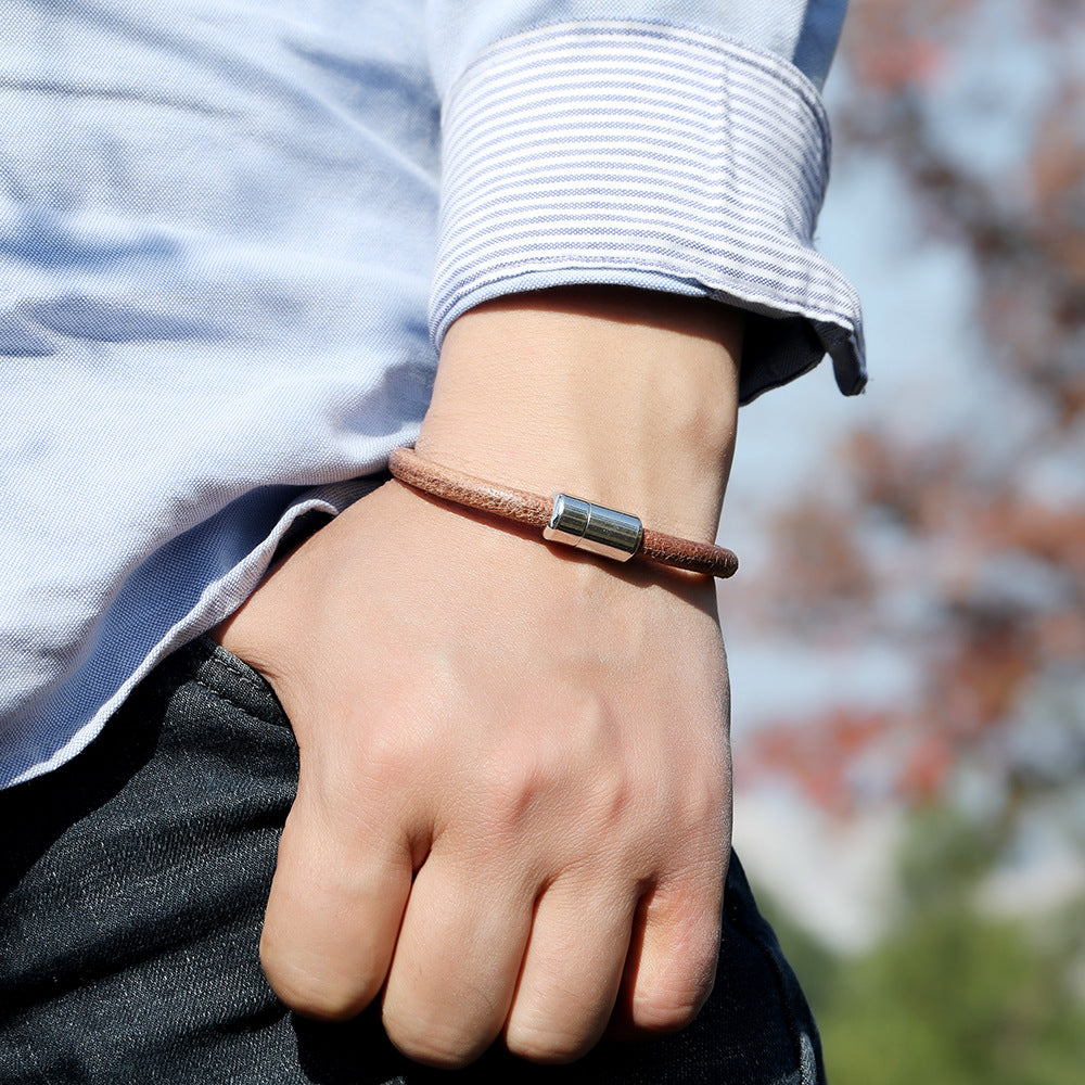 Men's Plain Leather Cord Bracelet in Brown – contextual scene, on wrist