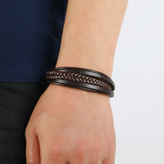 Men's Parallel Faux Leather Braid Bracelet in Brown – contextual scene, on wrist