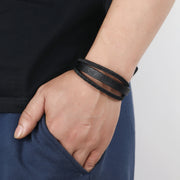 Men's Grain and Braid Layer Bracelet in Black – contextual scene, on wrist