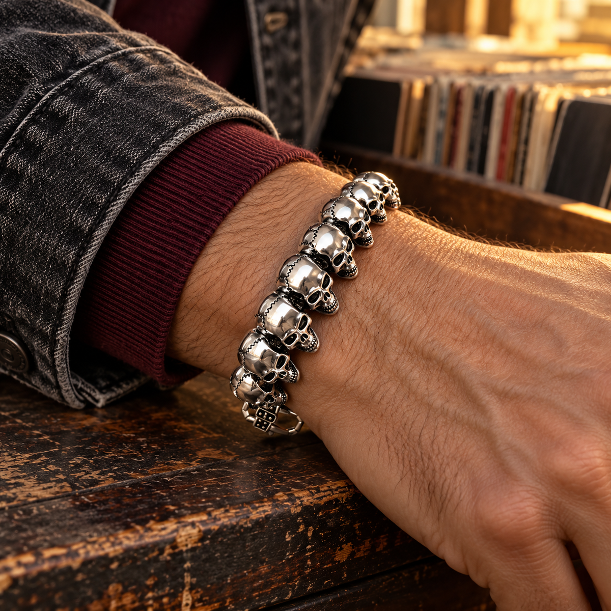 Men's Cracked Skull Row Bracelet in Silver-Tone Steel – contextual scene, on wrist