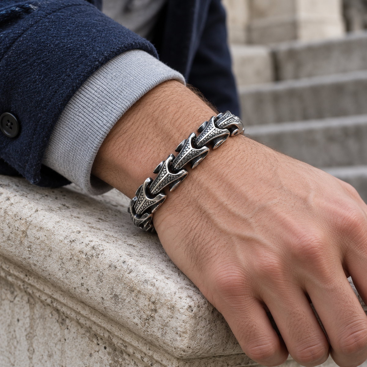 Men's Dragon Scroll Link Bracelet in Antiqued Silver-Tone Steel – contextual scene, on wrist