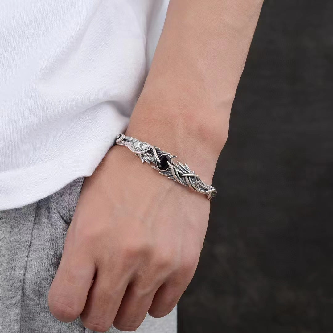 Men's Thorn Leaf Sterling Silver Cuff in 925 Sterling Silver – contextual scene, on wrist