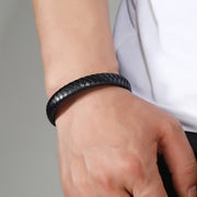 Men's Flat Plait Bracelet in Black – contextual scene, on wrist