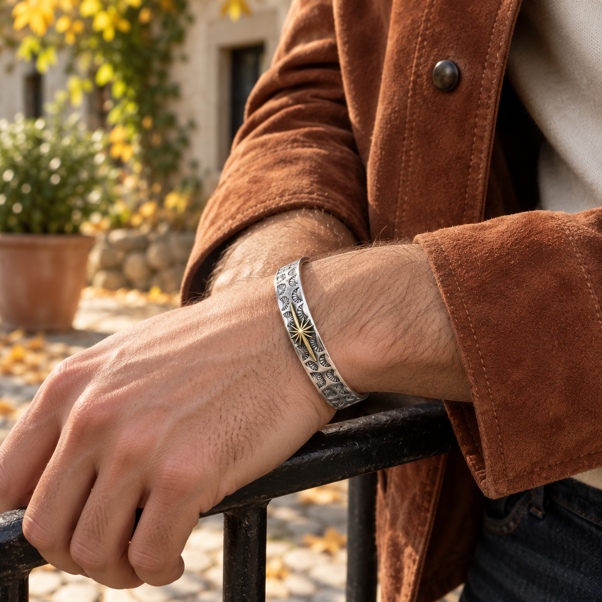 Men's Radiant Fan Cuff in Sterling Silver / Gold-Tone Accent – contextual scene, on wrist with a rust suede overshirt