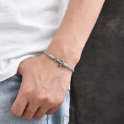 Men's Anchor Twist Bracelet in Sterling Silver – contextual scene, on wrist with a white shirt