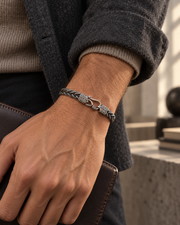 Men's Interwoven Hook Bracelet in 925 Sterling Silver – contextual scene, on wrist