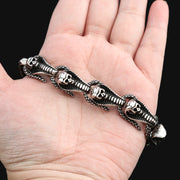 Men's Ribbed Skull Link Bracelet in Silver-Tone Steel – original handheld skull, ribbed neck and scale rail detail