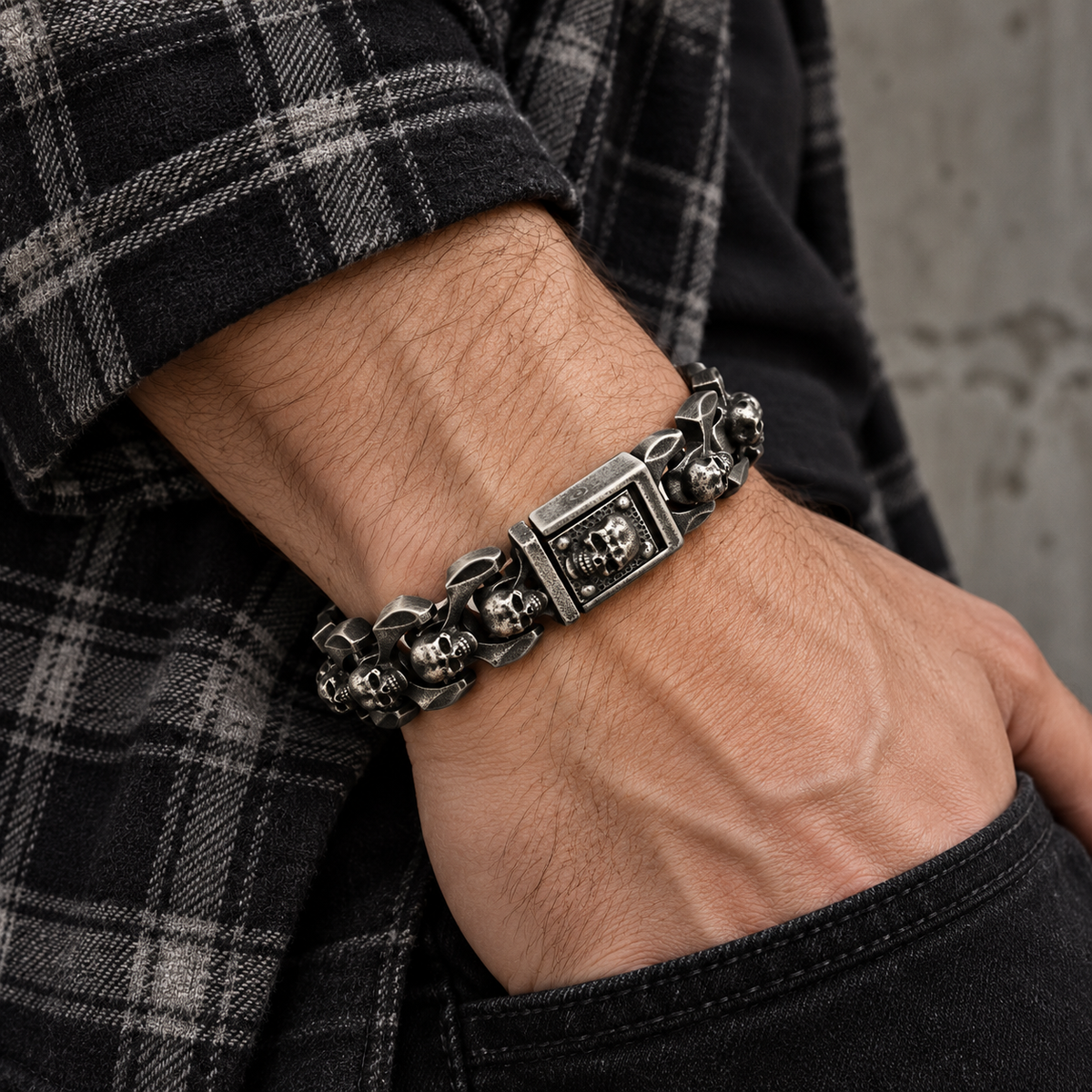 Men's Angular Skull Link Bracelet in Silver-Tone Steel – contextual scene, on wrist