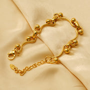 Men's Ball Tip Bar Link Bracelet in Gold Plated Steel – original ball ends, joints and clasp detail