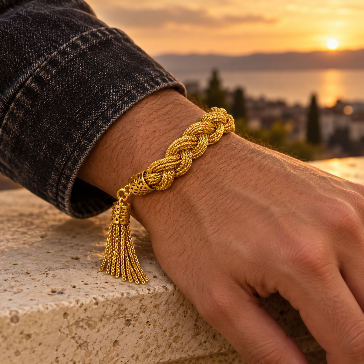 Men's Braided Tassel Bracelet in 18K Gold Plated Copper – contextual scene, on wrist