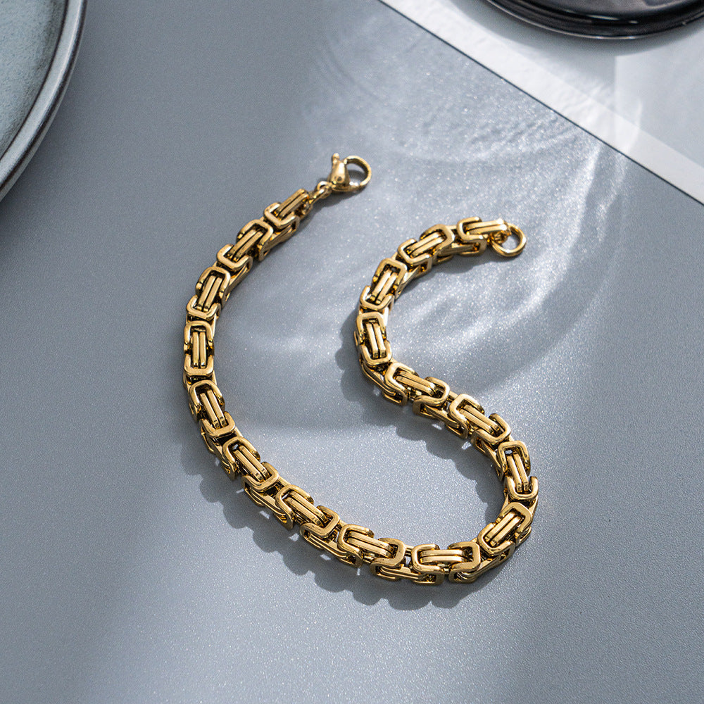 Men's Golden Box Weave Bracelet in gold-tone stainless steel – original detail of open links and lobster clasp