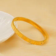 Men's Meander Band Bangle in 18K Gold Plated Steel – original pattern and hinged clasp detail