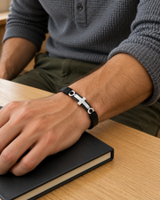 Men's Cross Ring Faux Leather Bracelet in Black Faux Leather and Steel – contextual scene, on wrist
