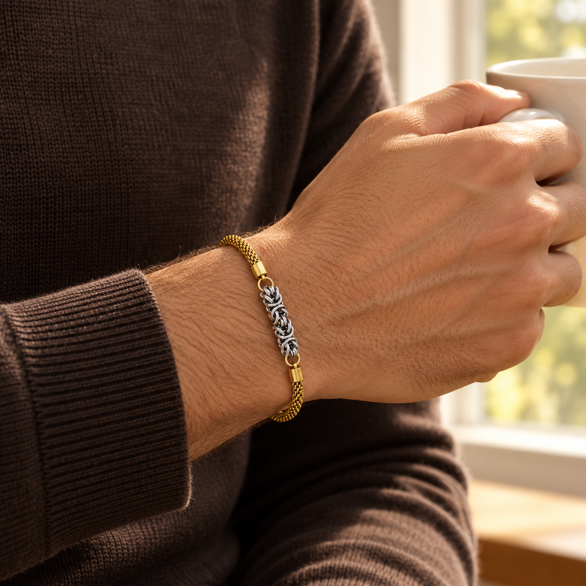 Men's Woven Scroll Bracelet in Gold-Tone Plated Steel – contextual scene, on wrist