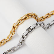 Men's Open Frame Chain Bracelet in Gold Plated Steel – original gold plated open rectangular link and zirconia detail beside the silver-tone finish