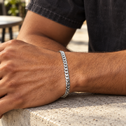 Men's Flat Curb Bracelet in 925 Sterling Silver – contextual scene, on wrist