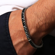 Men's Black Baguette Tennis Bracelet in Steel; Silver-Tone Finish; Black Cubic Zirconia – original on wrist detail