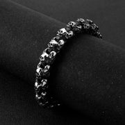 Men's Four Face Skull Bracelet in Silver-Tone Steel – original side view of the four-sided skull links