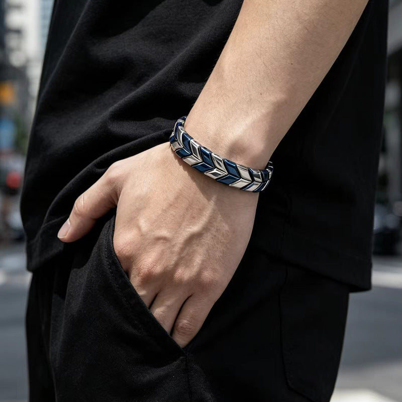 Men's Chevron Crest Bracelet in Blue / Silver-Tone Steel – contextual scene, on wrist with black casual clothing