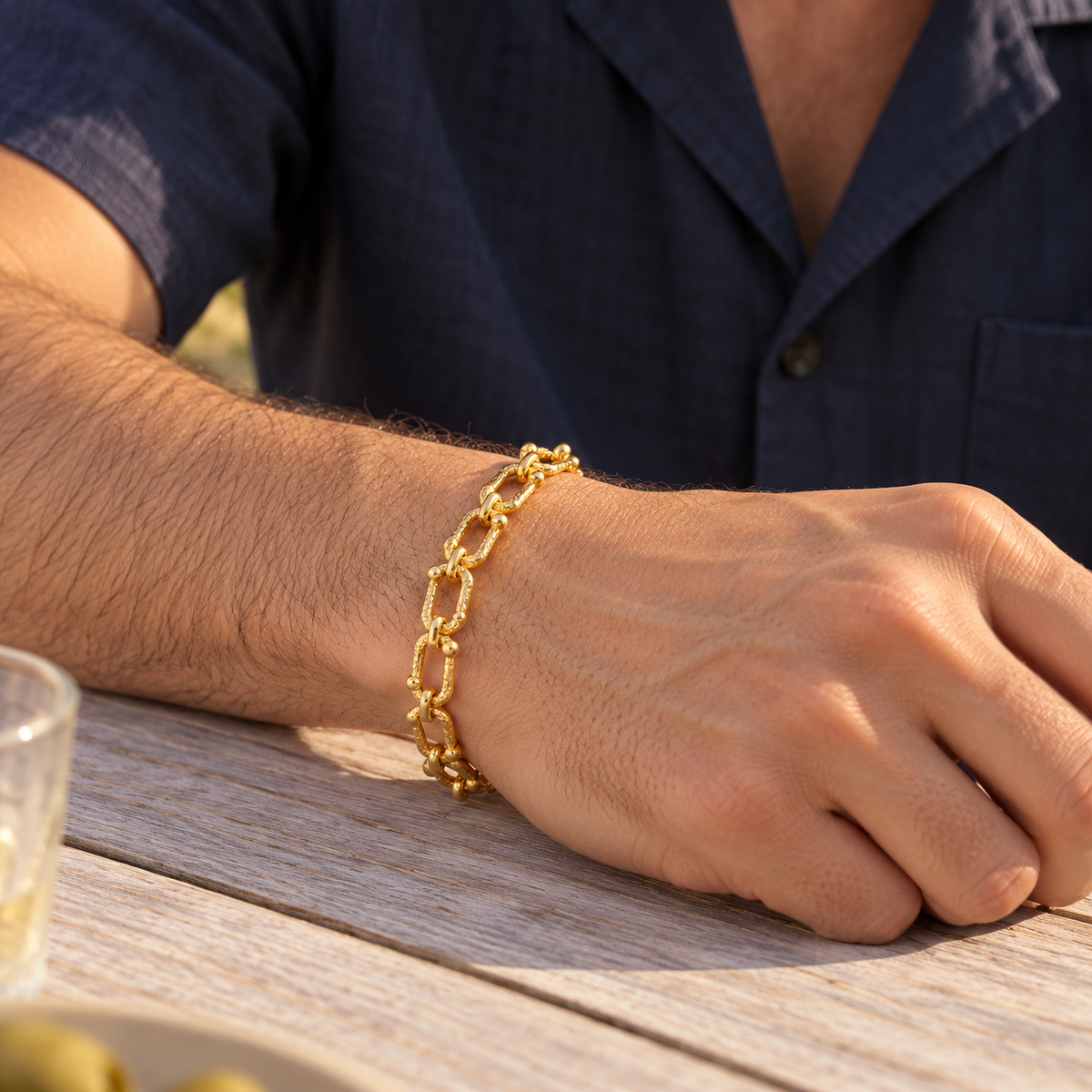 Men's Ornate Open-Link Bracelet in 18K Gold Plated Copper – contextual scene, on wrist