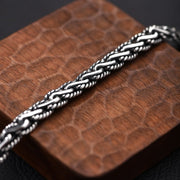 Men's Curved Bridge Chain Bracelet in Sterling Silver – original curved links and twisted edges detail