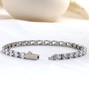 Men's Oval Light Tennis Bracelet in Silver-Tone Steel – open box clasp and oval stone setting detail